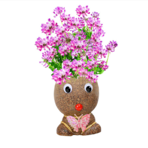 grass sprouting head doll